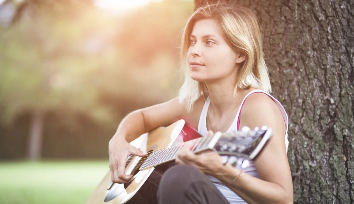 learning to play guitar